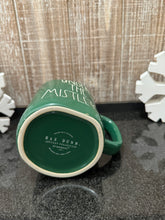 Load image into Gallery viewer, Rae Dunn Under The Mistletoe Green Mug with Printed Stitches
