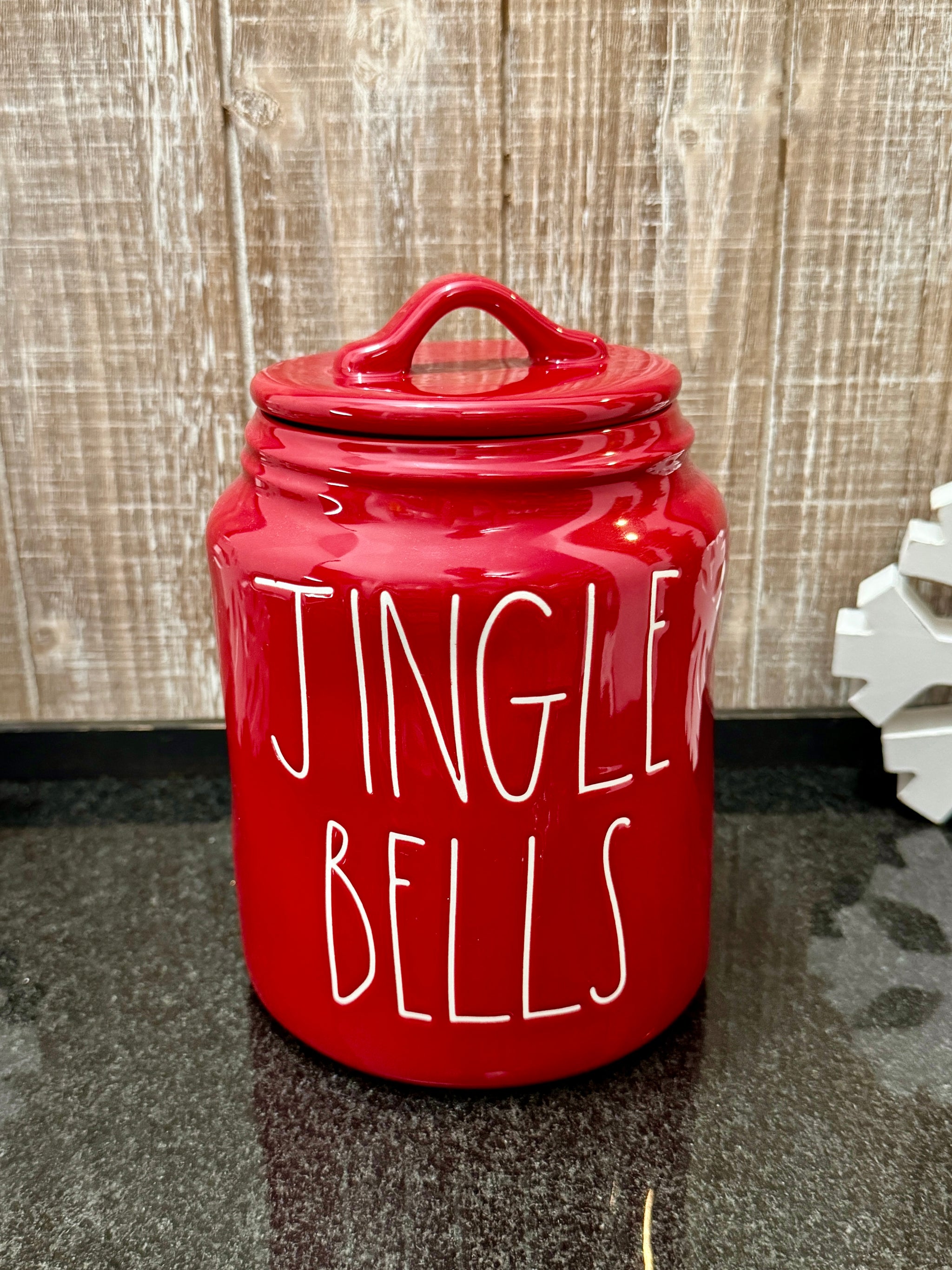 Rae top Dunn Jingle Bells canister